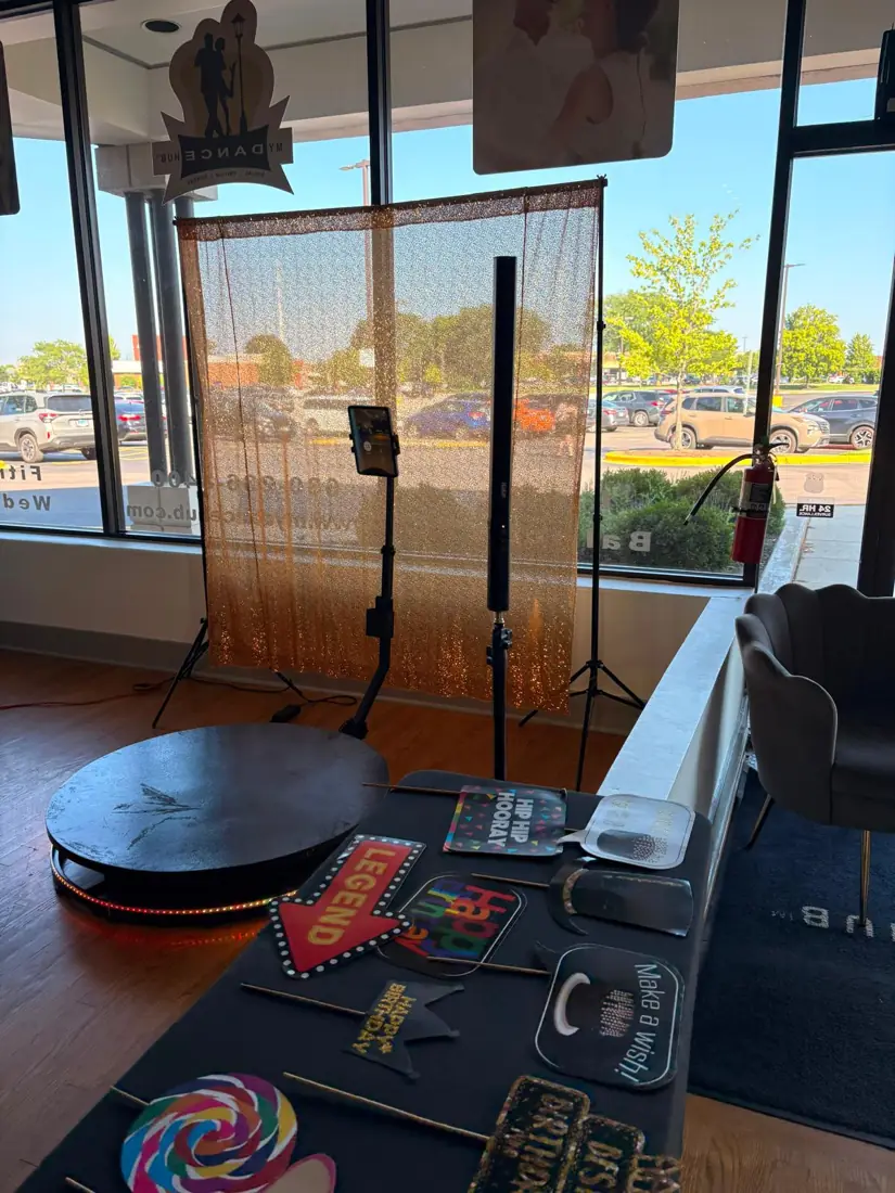 Tablet photo booth on a stand with props